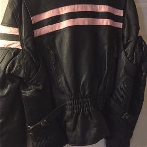 Ladies medium leather jacket with pink stripes.